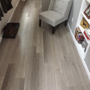 DLX Hardwood - NuCORE flooring in Dune. Purchased from Floors and Decor. - Flooring Near Me