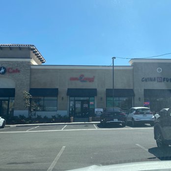 More Curry! - Exterior of shopping center - Indian Near Me - Corona, California More Curry! - Exterior of shopping center - Indian Near Me - Corona, California