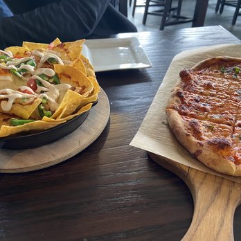 Tavern in the Square - Nachos with chicken and cheese pizza - New American Near Me - Wrentham, Massachusetts Tavern in the Square - Nachos with chicken and cheese pizza - New American Near Me - Wrentham, Massachusetts
