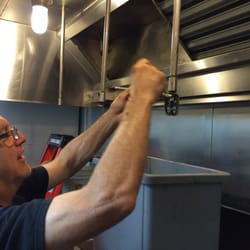 Durbiano Fire Protection - Removing water based sprinklers in a commercial kitchen before installing a UL300 wet chemical fire suppression system.