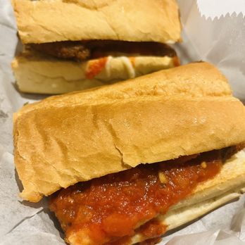 Cafe Assisi - two sandwiches with meat and tomato sauce - Italian Near Me - Wrentham, Massachusetts Cafe Assisi - two sandwiches with meat and tomato sauce - Italian Near Me - Wrentham, Massachusetts