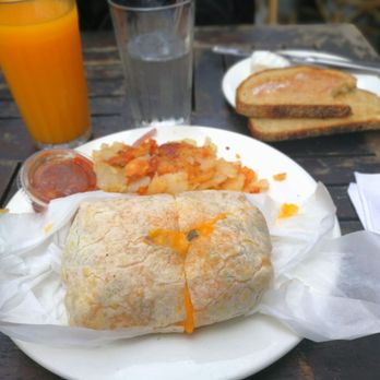 George's - Breakfast burrito with a side of toast, very good. - American Near Me - New York, New York George's - Breakfast burrito with a side of toast, very good. - American Near Me - New York, New York