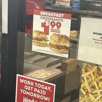Wendy's - A girl hid w/2 cars left so she didn't have to answer any any questions. Her hair was everywhere. she sneezed and coughed on all the food. - Burgers Near Me - Tacoma, Washington