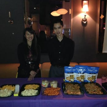 One Brick Boston - One Brickers manning the food table during Project Smile Charity Date Auction - Community Service/Non-Profit Near Me