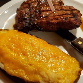 Ribeyes - 12 oz Ribeye and twice baked potato. - Steakhouses Near Me - Cornelia, Georgia