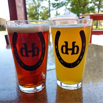 Draught Horse Brewery - two glasses of beer on a table - Breweries Near Me - Lyon Charter Township, Michigan Draught Horse Brewery - two glasses of beer on a table - Breweries Near Me - Lyon Charter Township, Michigan