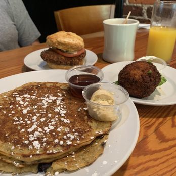 The Basics - My sister had the Fried Chicken Biscuit and I had the Blueberry Oatmeal Pancakes with a side of the Potato Cake! So good! - Southern Near Me - Wilmington, North Carolina