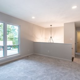 empty living room with sliding glass doors empty living room with sliding glass doors