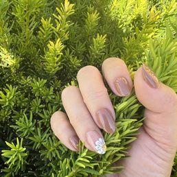 Manicure with dip color and jelly gel nail on ring finger Manicure with dip color and jelly gel nail on ring finger
