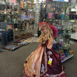 Titled: Umbrella doll. Price: $35.96