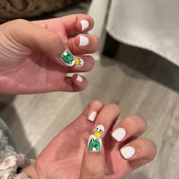 Gel manicure with frog prince design Gel manicure with frog prince design
