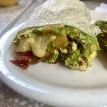 Egg Plantation - Breakfast Burrito - eggs- Turkey bacon - tomatoes - avocados- lots of cheese with homemade salsa - Breakfast & Brunch Near Me - Newhall, California Egg Plantation - Breakfast Burrito - eggs- Turkey bacon - tomatoes - avocados- lots of cheese with homemade salsa - Breakfast & Brunch Near Me - Newhall, California