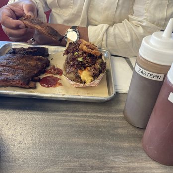 Daddy D’s BBQ - 1/2 rack ribs & smoked pork cheddar baked potato - Barbeque Near Me - Benson, North Carolina