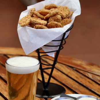 Dj's Bar and Grill - Crispy, tangy, and ranch-dipped - say hello to your new favorite starter: Chipotle Ranch Fried Pickles - Sports Bars Near Me - San Antonio, Texas Dj's Bar and Grill - Crispy, tangy, and ranch-dipped - say hello to your new favorite starter: Chipotle Ranch Fried Pickles - Sports Bars Near Me - San Antonio, Texas