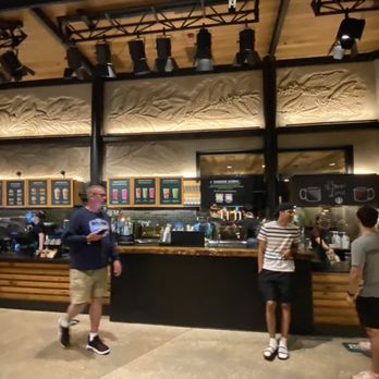 Starbucks - people standing in front of a coffee shop - Coffee & Tea Near Me - Lake Buena Vista, Florida Starbucks - people standing in front of a coffee shop - Coffee & Tea Near Me - Lake Buena Vista, Florida