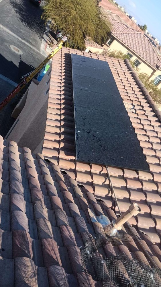 Slide of Tommy´s Roofing