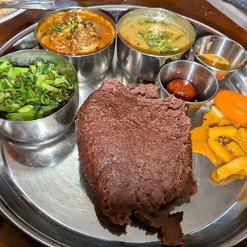 Spicy Nepal - Dhindo w.Goat ($15.95) - Himalayan/Nepalese Near Me - Sunnyside, New York Spicy Nepal - Dhindo w.Goat ($15.95) - Himalayan/Nepalese Near Me - Sunnyside, New York