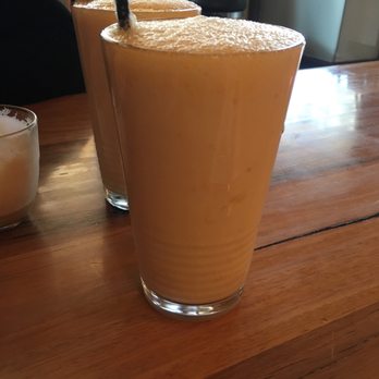 Toast Caffe - Banana smoothie with sweet yoghurt and orange juice - Coffee & Tea Near Me - North Melbourne, VIC Toast Caffe - Banana smoothie with sweet yoghurt and orange juice - Coffee & Tea Near Me - North Melbourne, VIC