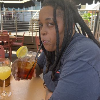 Hello, Sailor - Naj cooling down with her iced tea with a lemon slice. - Seafood Near Me - Cornelius, North Carolina Hello, Sailor - Naj cooling down with her iced tea with a lemon slice. - Seafood Near Me - Cornelius, North Carolina