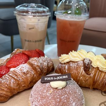 Tous Les Jours - Strawberry and creme croissant (left), mango cream (right), vanilla cream donut (middle). - Bakeries Near Me - Germantown, Maryland Tous Les Jours - Strawberry and creme croissant (left), mango cream (right), vanilla cream donut (middle). - Bakeries Near Me - Germantown, Maryland