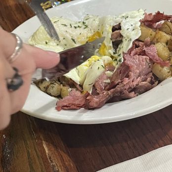 The Fainting Goat - Eggs over easy and it's corn beef and potatoes - Pubs Near Me - Denver, Colorado The Fainting Goat - Eggs over easy and it's corn beef and potatoes - Pubs Near Me - Denver, Colorado