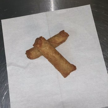 Acadian Food Mart - a piece of food on a piece of paper - Grocery Near Me - Lafayette, Louisiana