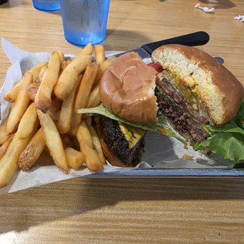 Greg's Cabana Bar & Grill - Half-pound char grilled Cheeseburger on Brioche Bun. - Bars Near Me - Murrells Inlet, South Carolina Greg's Cabana Bar & Grill - Half-pound char grilled Cheeseburger on Brioche Bun. - Bars Near Me - Murrells Inlet, South Carolina