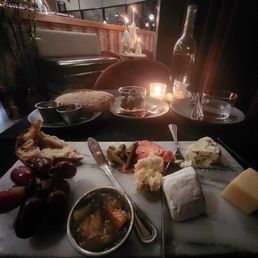 The cheese plate is discounted half off during happy hour