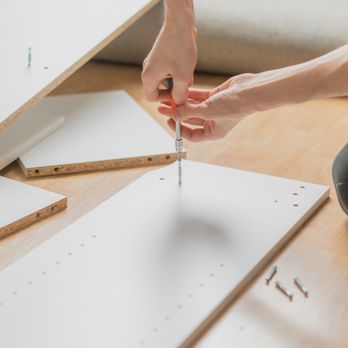 Mesquite Home Services - a person working on a project - Handyman Near Me