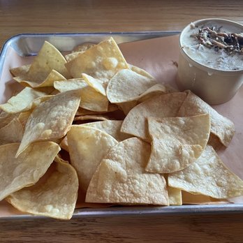 Hank's Texas BBQ - Queso with pulled pork and house made tortilla chips - Barbeque Near Me - Columbus, Ohio Hank's Texas BBQ - Queso with pulled pork and house made tortilla chips - Barbeque Near Me - Columbus, Ohio