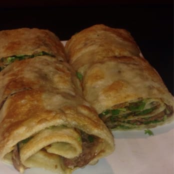 101 Noodle Express - Pork & shrimp pot stickers, and their famed Beef Roll - Chinese Near Me - Alhambra, California 101 Noodle Express - Pork & shrimp pot stickers, and their famed Beef Roll - Chinese Near Me - Alhambra, California