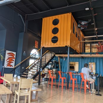 Broad Leaf Brewery & Spirits - Cool shipping container seating area upstairs - Beer Bar Near Me - Kentwood, Michigan