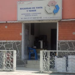 C.C. Laser - Estacionamiento en la calle.