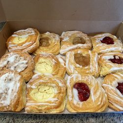 Danish: cheese, coffee crumb, cherry, and apple