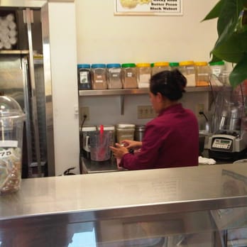 Country Donuts - a woman at the counter - Donuts Near Me - Long Beach, California