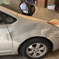 Dreamworks Collision - 2004 Prius highway pile up damage at passenger door and front bumper.