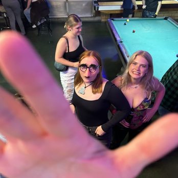 Rogers Rec - a group of people standing around a pool table - Dive Bars Near Me - Fayetteville, Arkansas Rogers Rec - a group of people standing around a pool table - Dive Bars Near Me - Fayetteville, Arkansas