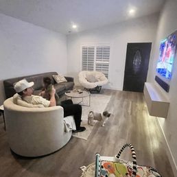 Wall with the couch is where our fireplace was. Can't even tell it was there!