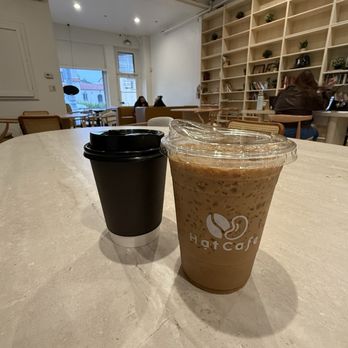 Hạt Cafe - Left: hot Saigon latte, Right: iced classic passion Vietnamese latte - Coffee & Tea Near Me - San Gabriel, California Hạt Cafe - Left: hot Saigon latte, Right: iced classic passion Vietnamese latte - Coffee & Tea Near Me - San Gabriel, California