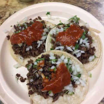 Tacos Michoacán - Tacos carne asada with everything and topped with hot sauce - Mexican Near Me - Mission Hills, California Tacos Michoacán - Tacos carne asada with everything and topped with hot sauce - Mexican Near Me - Mission Hills, California