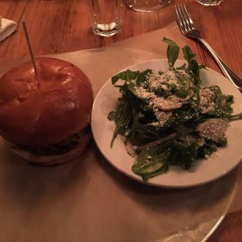 Leon's Full Service - Burger and arugula salad - Gastropubs Near Me - Decatur, Georgia