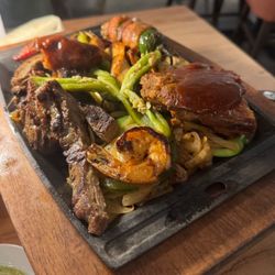 Spanish Flowers Cocina Mexicana - Shareable Platter- Fajita Steak and Chicken, ribs, grilled shrimp, bacon wrapped jalapeño, sausage. We also had a platter with Quail.
