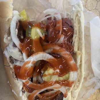 Chaps Pit Beef - The raven dressed with house sauce tiger sauce onion and pickle - Barbeque Near Me - Baltimore, Maryland