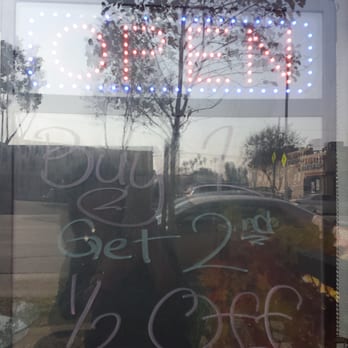 Yummy Tea House - a sign in the window - Tea Rooms Near Me - Alhambra, California Yummy Tea House - a sign in the window - Tea Rooms Near Me - Alhambra, California