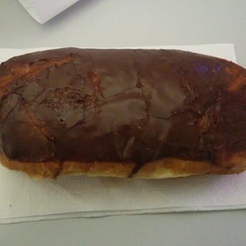 Central Donut - It was pretty but it got tossed around in the bag. Lol. Filled upon request with white cream. - Donuts Near Me - Austin, Texas