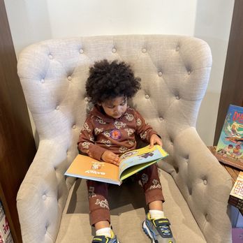 Story on the Square - My Grandson enjoying a book at the Bookstore. - Bookstores Near Me - McDonough, Georgia Story on the Square - My Grandson enjoying a book at the Bookstore. - Bookstores Near Me - McDonough, Georgia