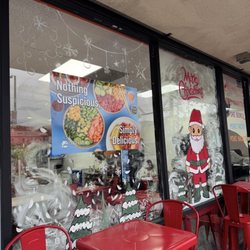 Surfside Murals - Christmas Santa mural painting for storefront
