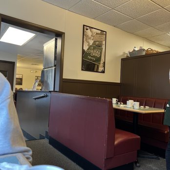 The Place To Be - a man sitting at a table with a cup of coffee - Diners Near Me - Lakewood, Ohio The Place To Be - a man sitting at a table with a cup of coffee - Diners Near Me - Lakewood, Ohio