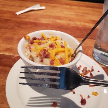 Cheddar's Scratch Kitchen - This is their cup of soup.  You can see the size of it with the fork.  I regretted getting 2 cups for the family and paying almost $9. - American Near Me - Aurora, Colorado