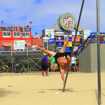Venice Beach Boardwalk - Impressive gymnastic move at Muscle Beach Venice - Beaches Near Me - Venice, California Venice Beach Boardwalk - Impressive gymnastic move at Muscle Beach Venice - Beaches Near Me - Venice, California